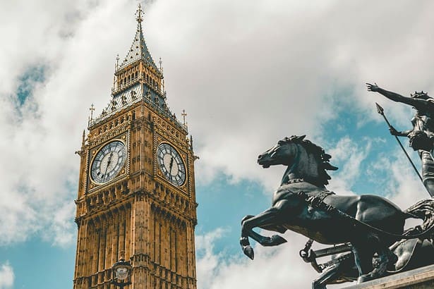 Big Ben and Statue Against London Sky